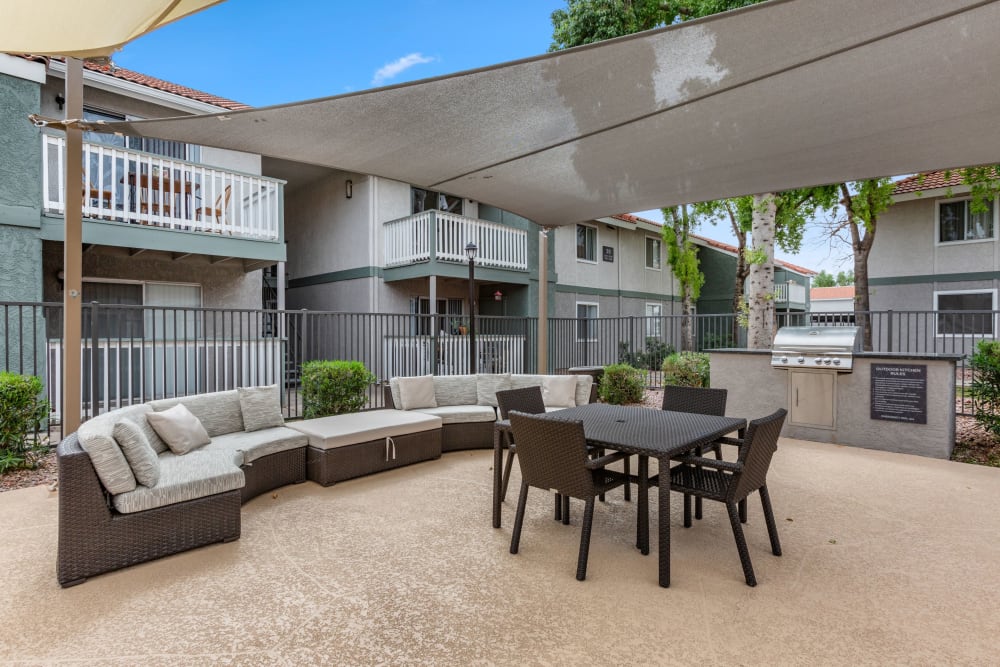 Partially covered outdoor seating area at 505 West Apartment Homes in Tempe, Arizona
