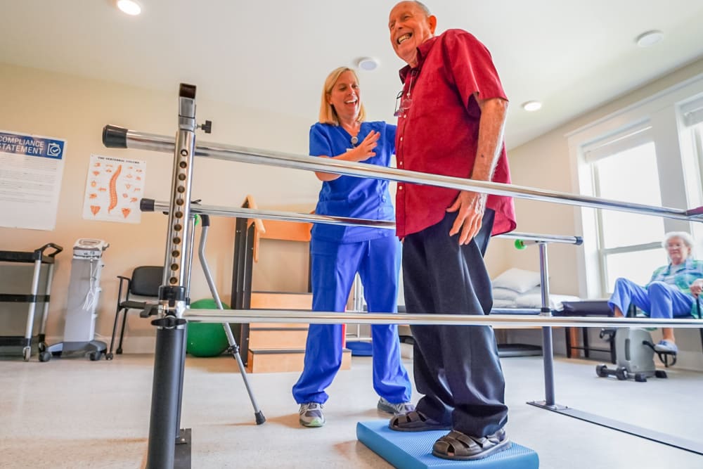 Resident in physical therapy with nurse The Harmony Collection at Roanoke - Independent Living in Roanoke, Virginia