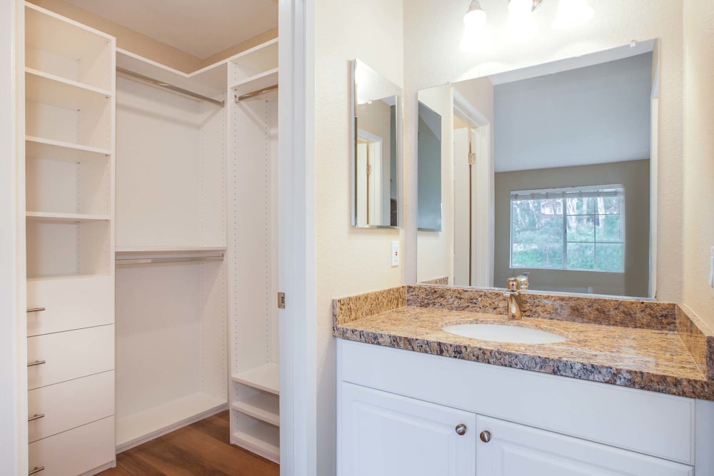 Closet area with a vanity sink at Sofi Ocean Hills in Oceanside, California
