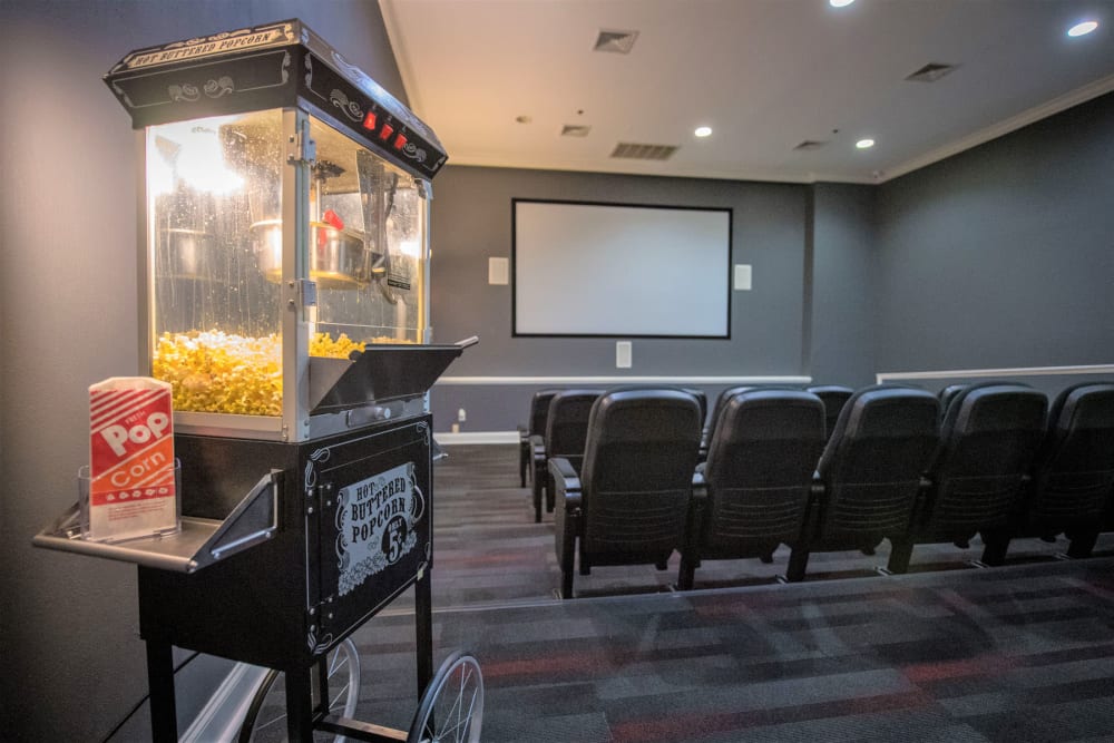 Onsite movie theater with a popcorn machine at Eagle Rock Apartments at Fishkill in Fishkill, New York