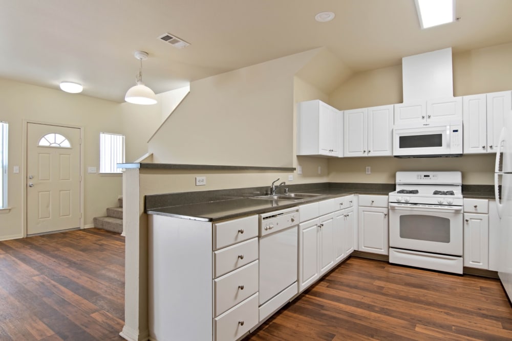a fully equipped kitchen at Wire Mountain I in Oceanside, California