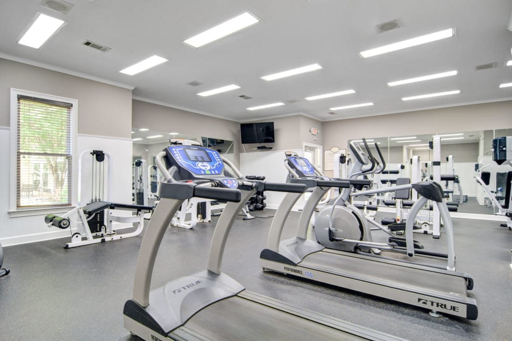 Treadmills in fitness Center at Amber Chase Apartment Homes in McDonough, Georgia