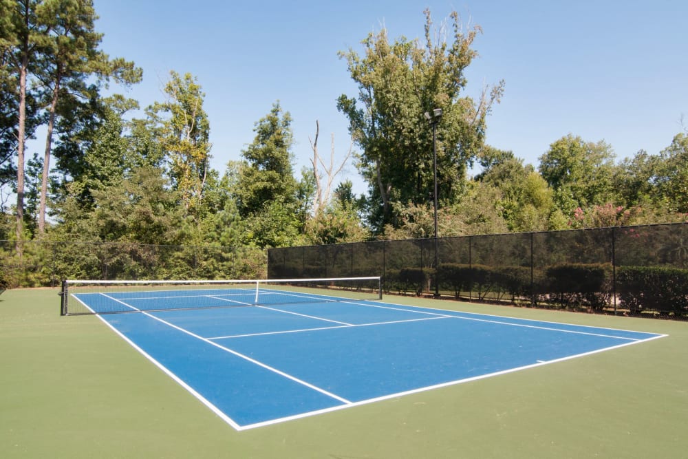 Tennis court at Amber Chase Apartment Homes in McDonough, Georgia