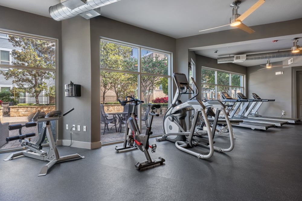 Fully equipped fitness center at The Marquis of State Thomas in Dallas, Texas
