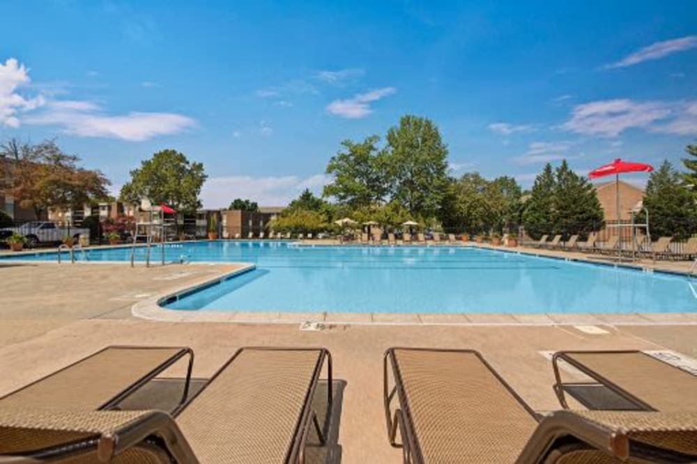 Lounge chairs poolside at Cinnamon Run at Peppertree Farm in Silver Spring, Maryland
