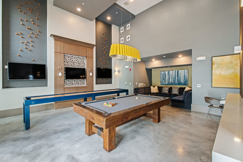 Pool table and shuffleboard in Clubhouse at Linden Crossroads in Orlando, Florida