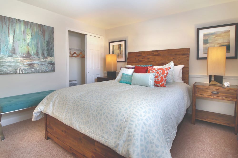 Model bedroom with a view of the closet at Middlesex Crossing in Billerica, Massachusetts