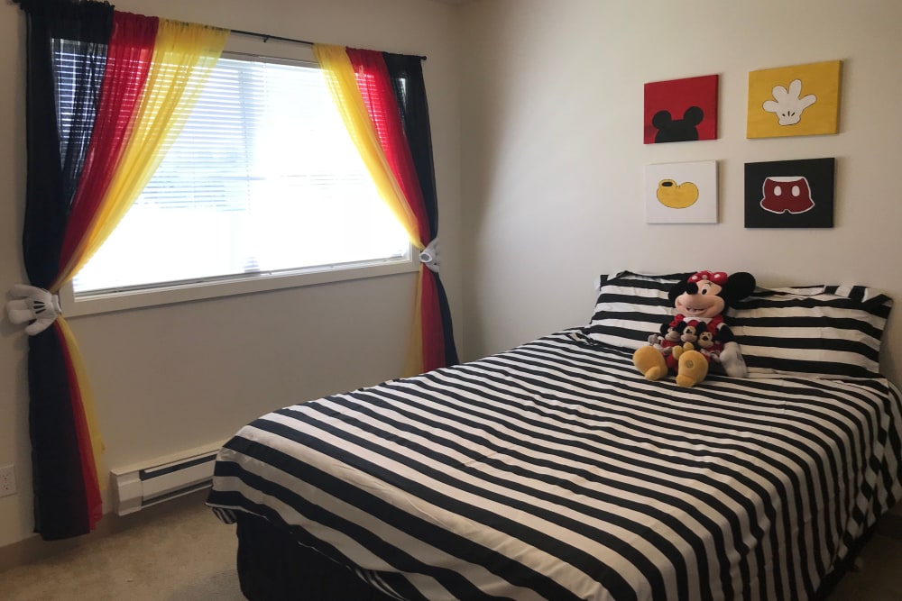 A furnished bedroom in a home at Carter Lake in Joint Base Lewis McChord, Washington