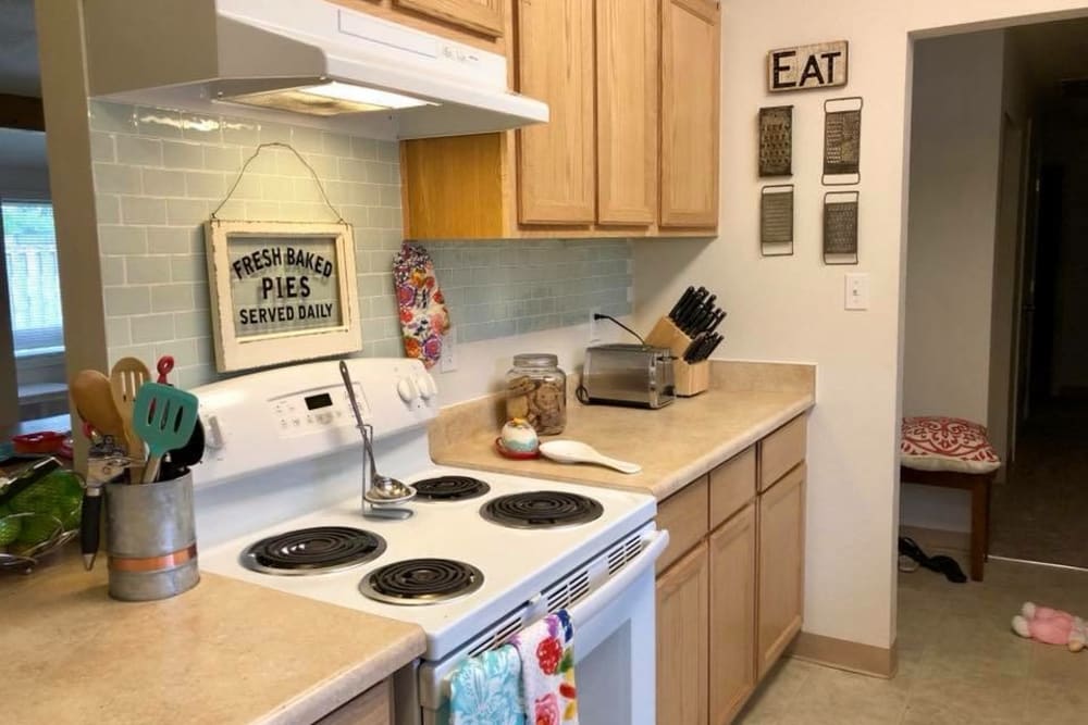Well-lit kitchen in a home at Carter Lake in Joint Base Lewis-McChord, Washington