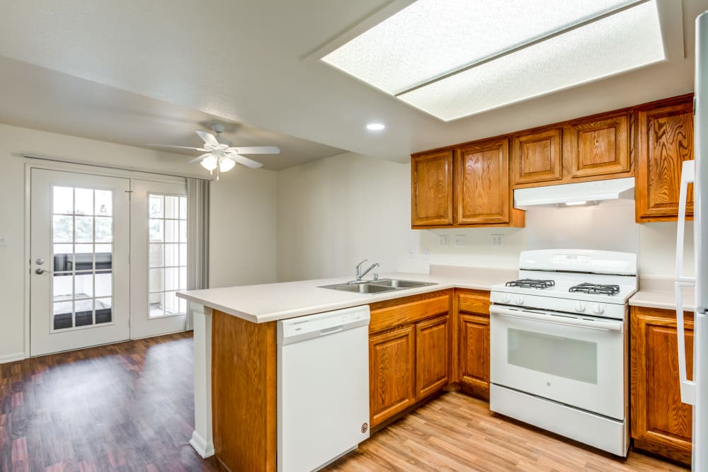 A well-lit kitchen in a home at Carl Vinson Park in Lemoore, California