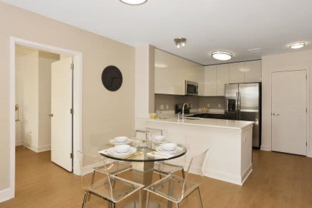 Dining nook by kitchen bar at ONE23 Apartments in Union City, New Jersey