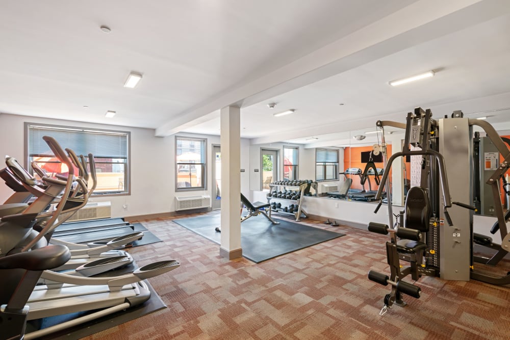Well equipped fitness center at ONE23 Apartments in Union City, New Jersey
