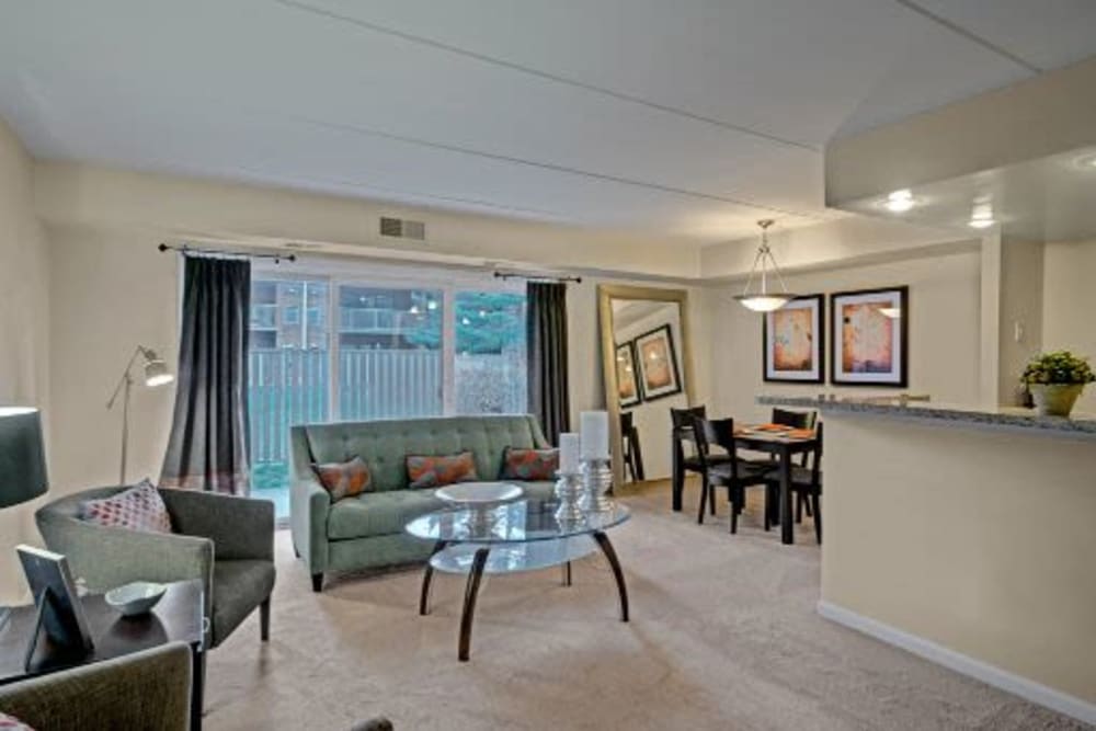 Living room and dining nook at Racquet Club Apartments and Townhomes in Levittown, Pennsylvania