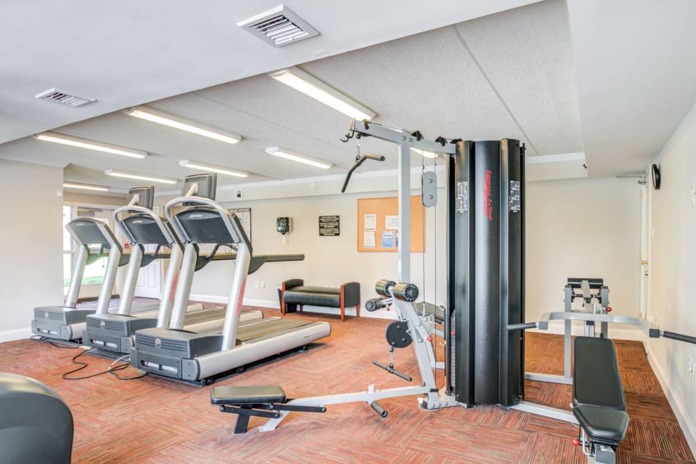 Free weights in fitness Center at Racquet Club Apartments and Townhomes in Levittown, Pennsylvania