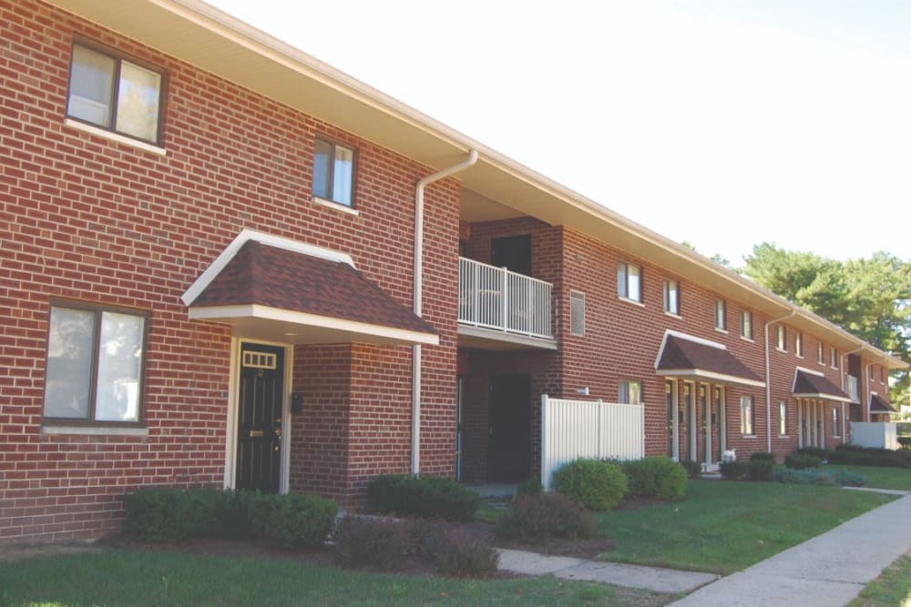 Building exterior view at Racquet Club Apartments and Townhomes in Levittown, Pennsylvania