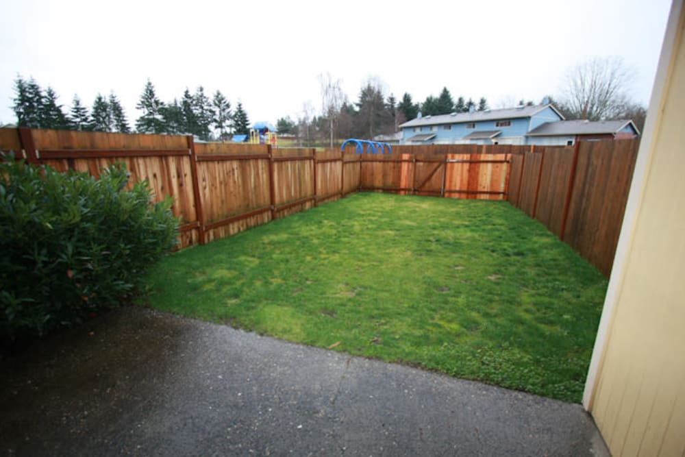 A fenced backyard for a home at Hillside in Joint Base Lewis McChord, Washington