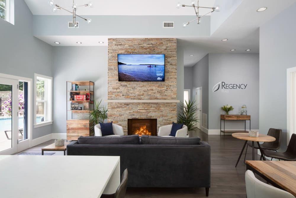 Fireplace and TV in Clubhouse at Regency Place in Wilmington, Massachusetts