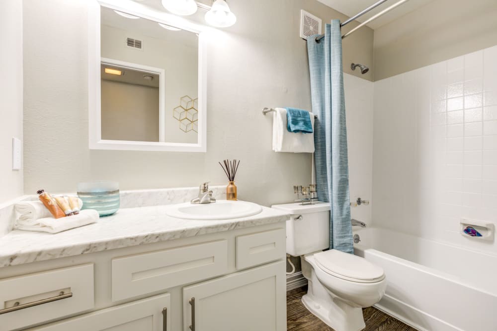 Bathroom with white cabinets at Santana Ridge in Denver, Colorado