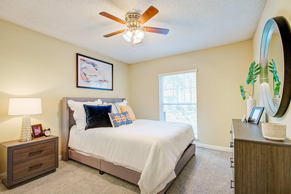 Decorated model bedroom at Signal Pointe Apartment Homes in Winter Park, Florida