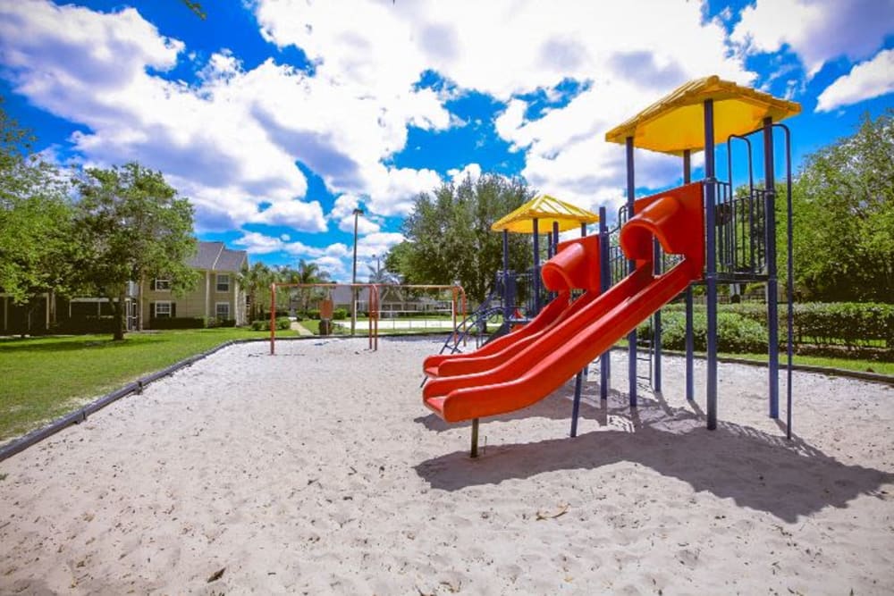 Outdoor playground at Signal Pointe Apartment Homes in Winter Park, Florida