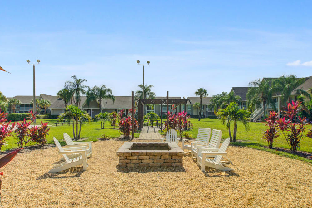 Outdoor fire pit at Signal Pointe Apartment Homes in Winter Park, Florida