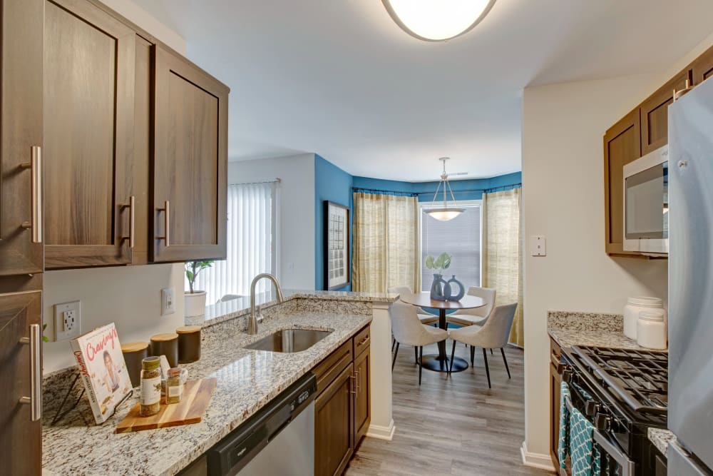 View of the dining nook from kitchen at Sussex at Kingstowne in Alexandria, Virginia