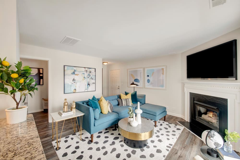 Family room with fireplace at Sussex at Kingstowne in Alexandria, Virginia