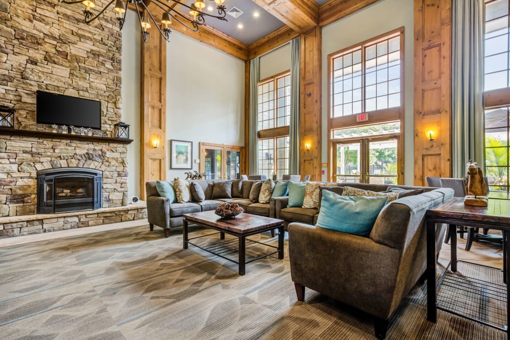 Clubhouse lounge with fireplace at Woodway at Trinity Centre in Centreville, Virginia