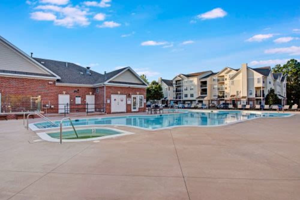 Hot tub and outdoor pool at Dulles Greene in Herndon, Virginia