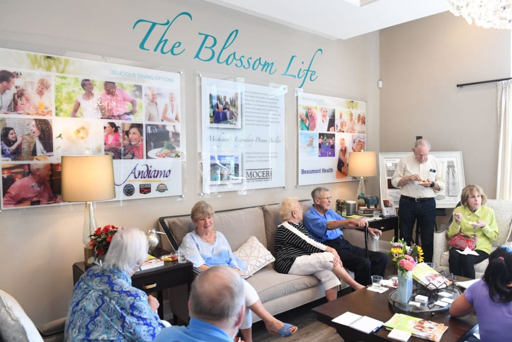 Residents relaxing on a couch at Blossom Ridge in Oakland Charter Township, Michigan