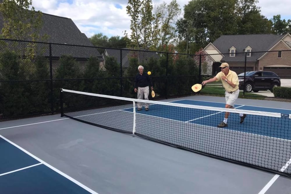 Residents playing pickleball at Blossom Ridge in Oakland Charter Township, Michigan