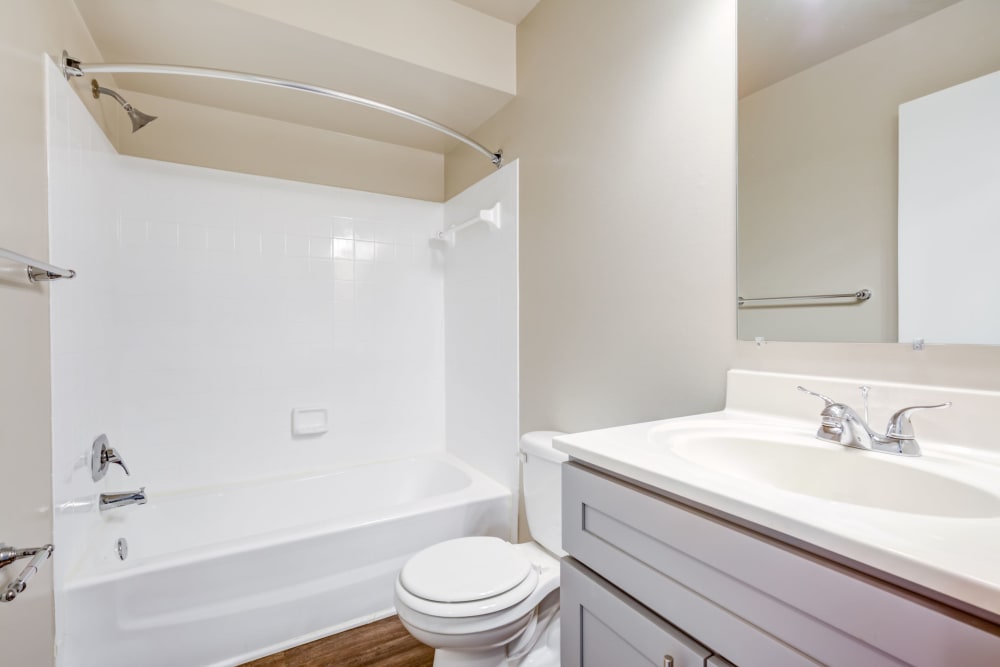 Model bathroom with bathtub at The Landings I & II Apartments in Alexandria, Virginia