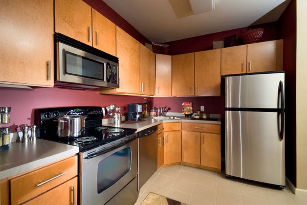 Beautiful open kitchen with stainless steel appliances at 55 Riverwalk Place in West New York, New Jersey