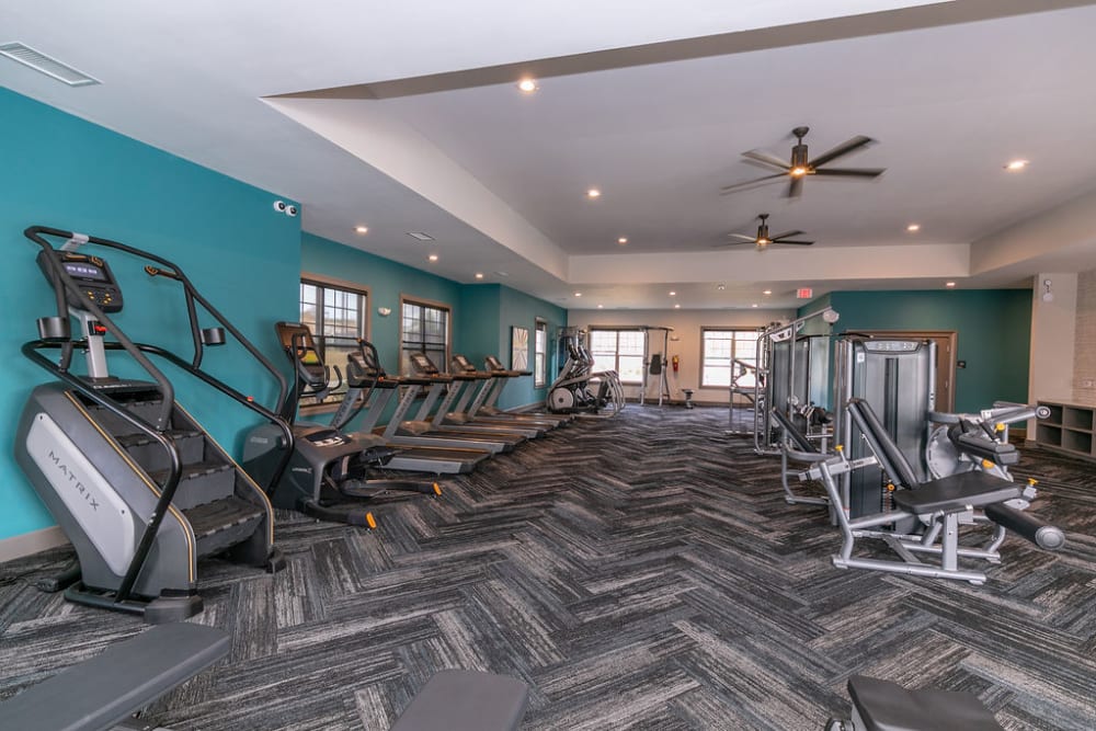 Fitness center with weight and cardio machines at Gibson Flowery Branch in Flowery Branch, Georgia