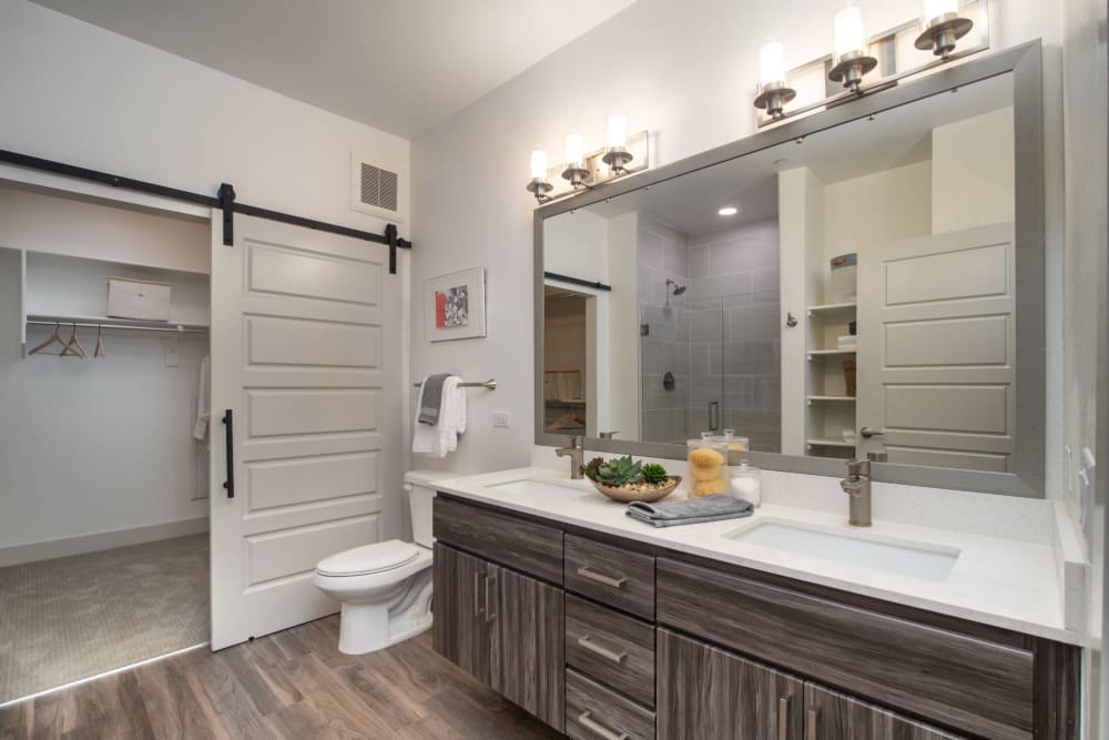Bathroom with double vanity at Marquis at Chandler in Chandler, Arizona