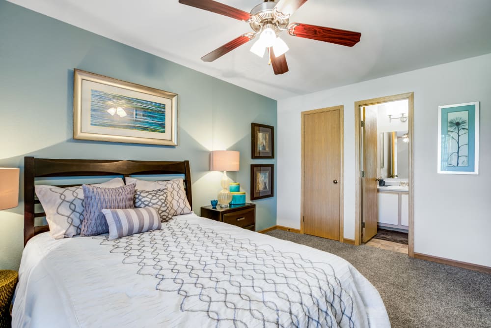 Beautiful bedroom with lots of natural lighting at Aberdeen Apartments in Lawrence, Kansas