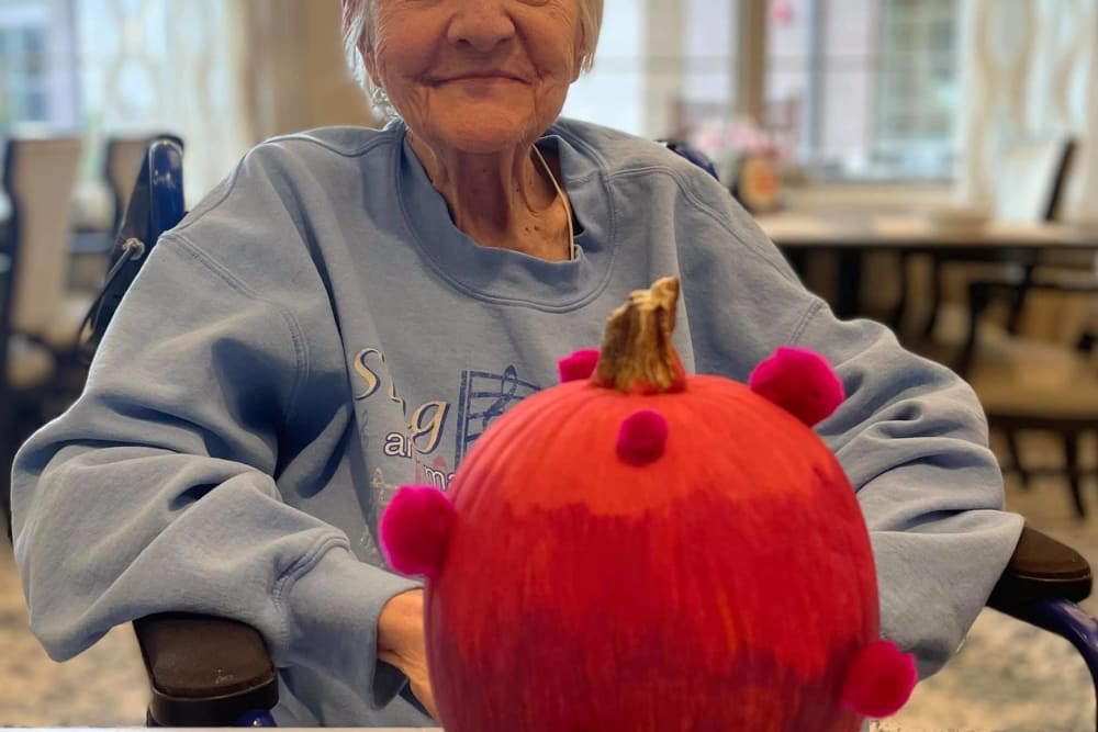 Blossom Springs resident proudly displaying a holiday craft.