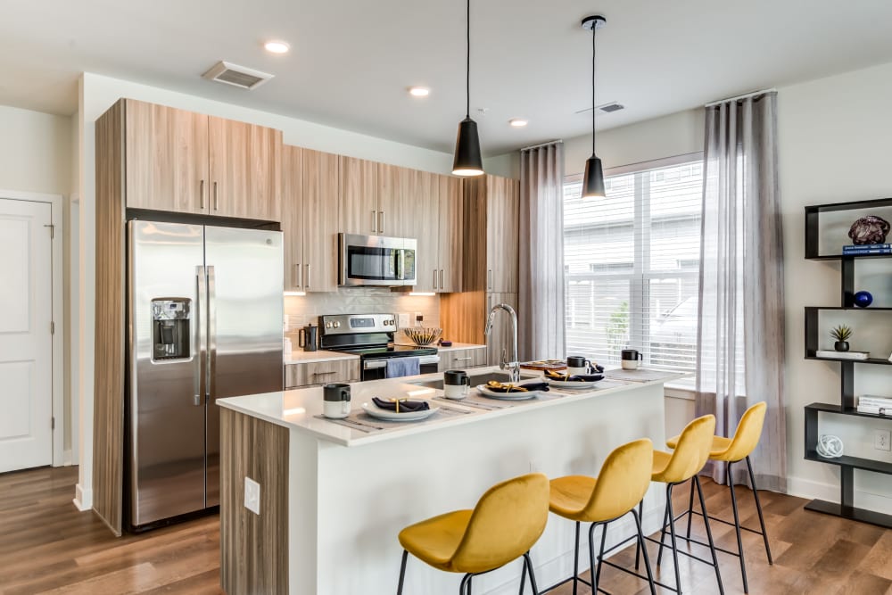 Gorgeous open kitchen with barstool seating at Everly in Largo, Maryland