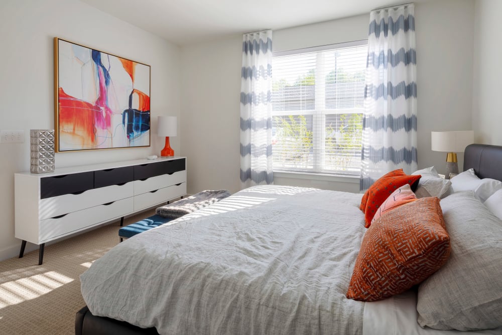 Model bedroom with modern decor at Everly in Largo, Maryland