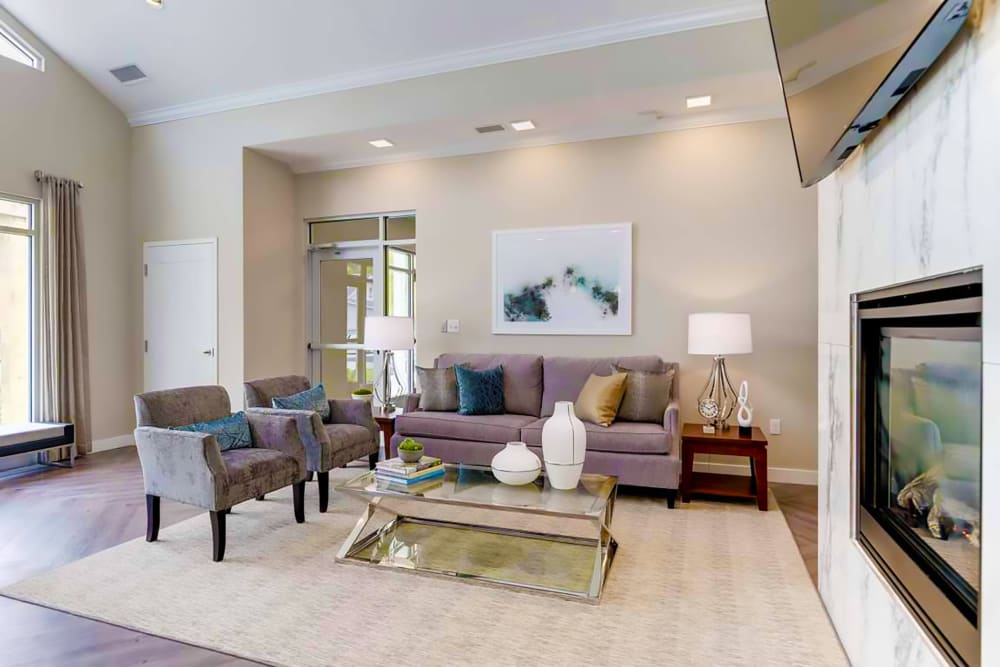 Community clubhouse living area at Satyr Hill Apartments in Parkville, Maryland