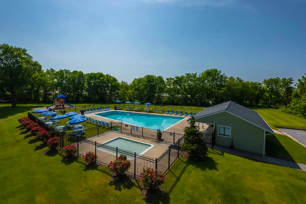 Community pool and clubhouse at Satyr Hill Apartments in Parkville, Maryland