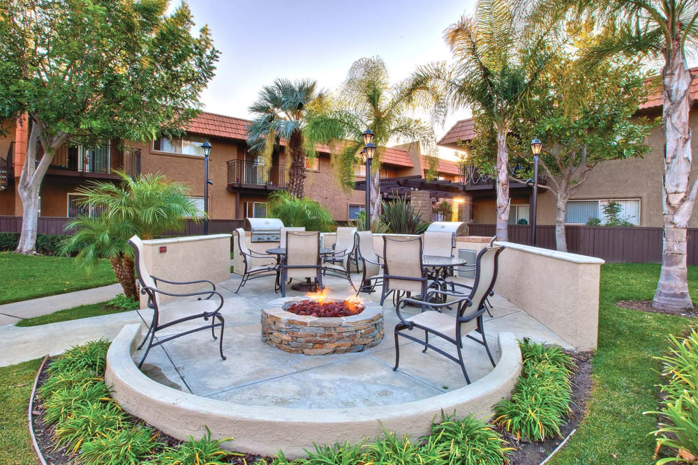 Awesome outdoor firepit with chairs sitting all around it at Terra Camarillo in Camarillo, California
