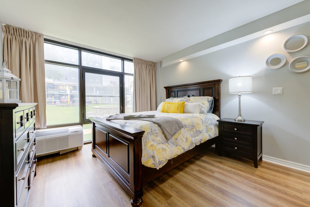 A master bedroom at Truewood by Merrill, Park Central in Dallas, Texas