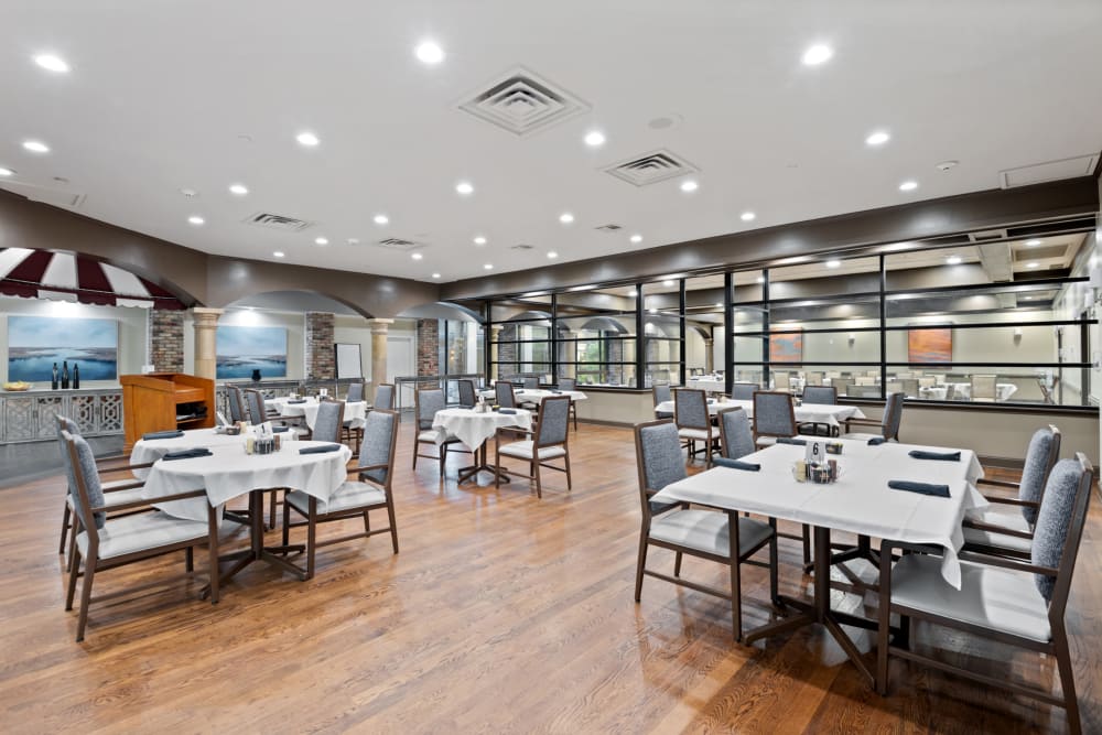 Share a meal with friends at Truewood by Merrill, Park Central in Dallas, Texas