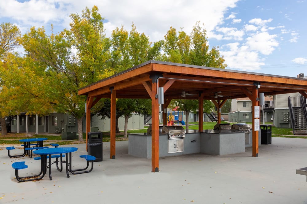 Covered Outdoor BBQ and Ping Pong Areas at Callaway Apartments in Taylorsville, Utah