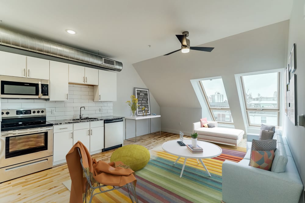 Living room with a private balcony at The 805W Lofts in Richmond, Virginia