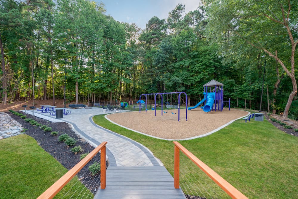 Playground and walking path at Aurella Cary in Cary, North Carolina