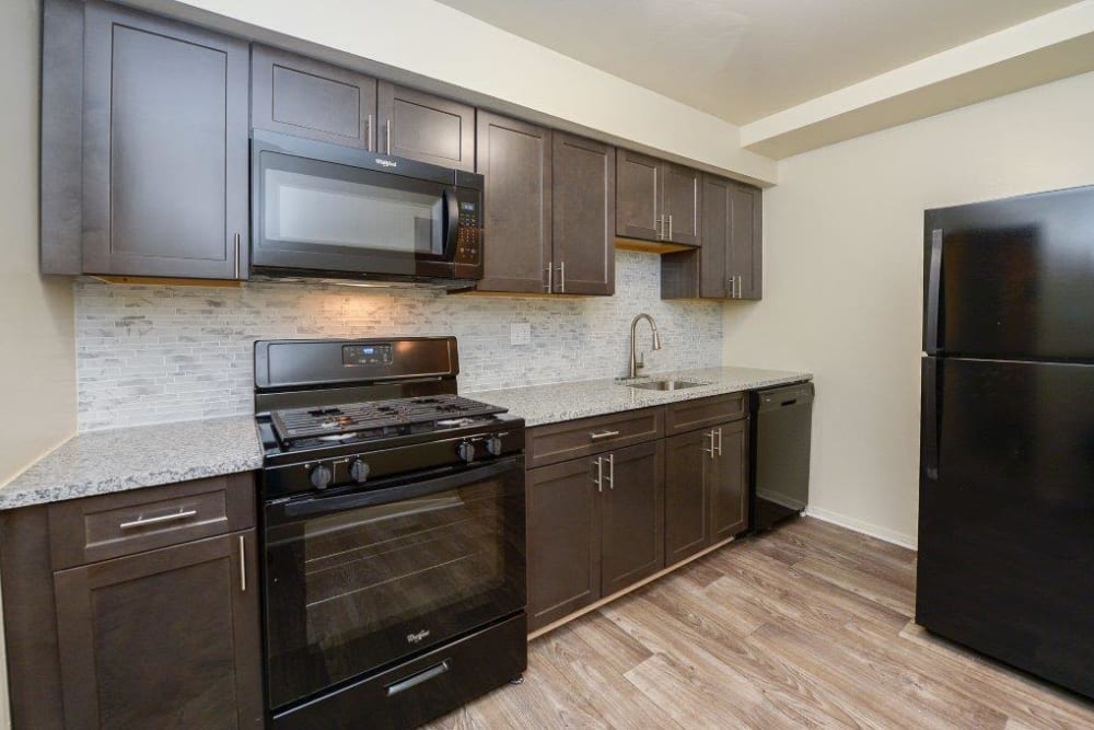 Equipped kitchen at The Village of Chartleytowne Apartments & Townhomes