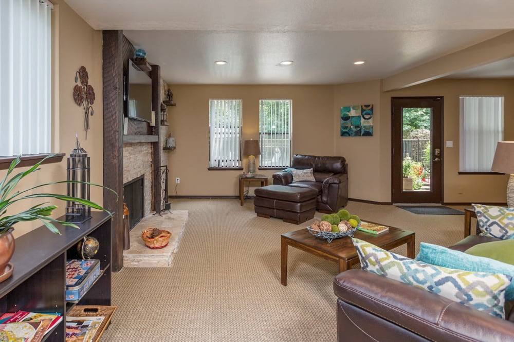 Clubhouse area with couch and comfy chairs to sit and relax in at Oswego Cove in Lake Oswego, Oregon