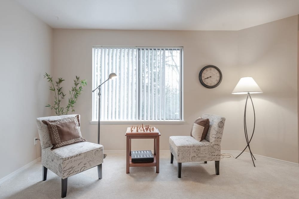 Cute little study or relaxation nook with two cozy chairs at Oswego Cove in Lake Oswego, Oregon